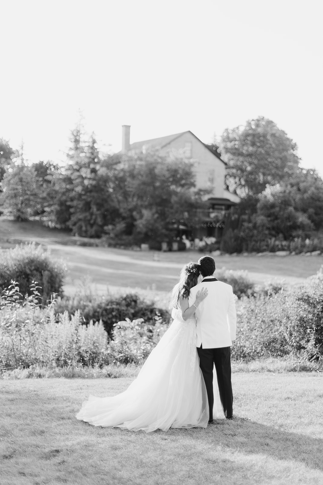 Bride and Groom on their Wedding day at the Mill Cobourg during the golden hour 