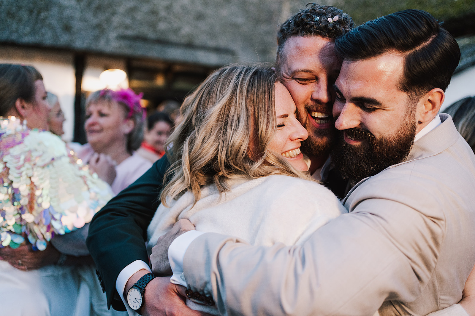 guests hugging groom at Axatorpsgården Wedding 