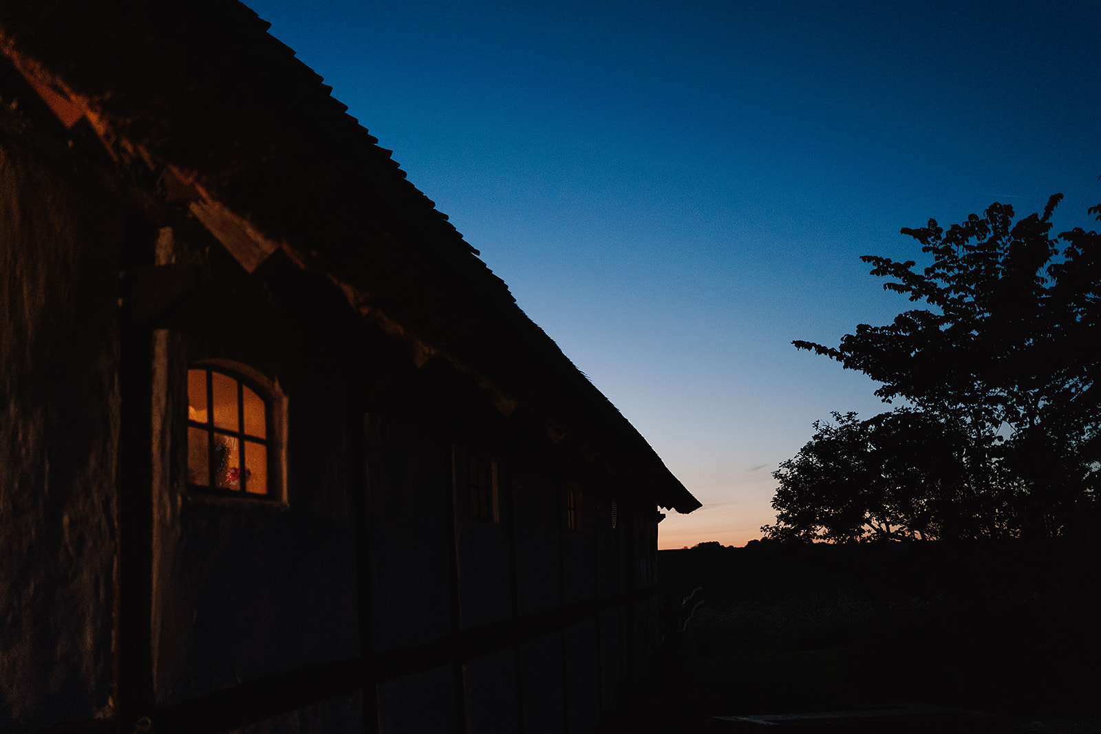 Axatorpsgården farmhouse at sunset