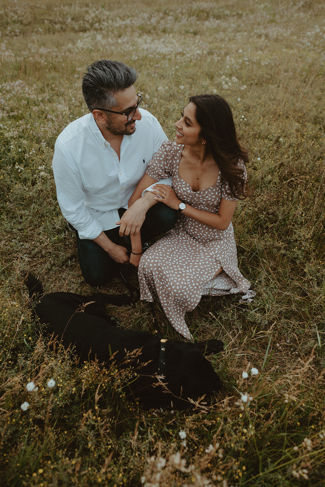 couple in wildflower field