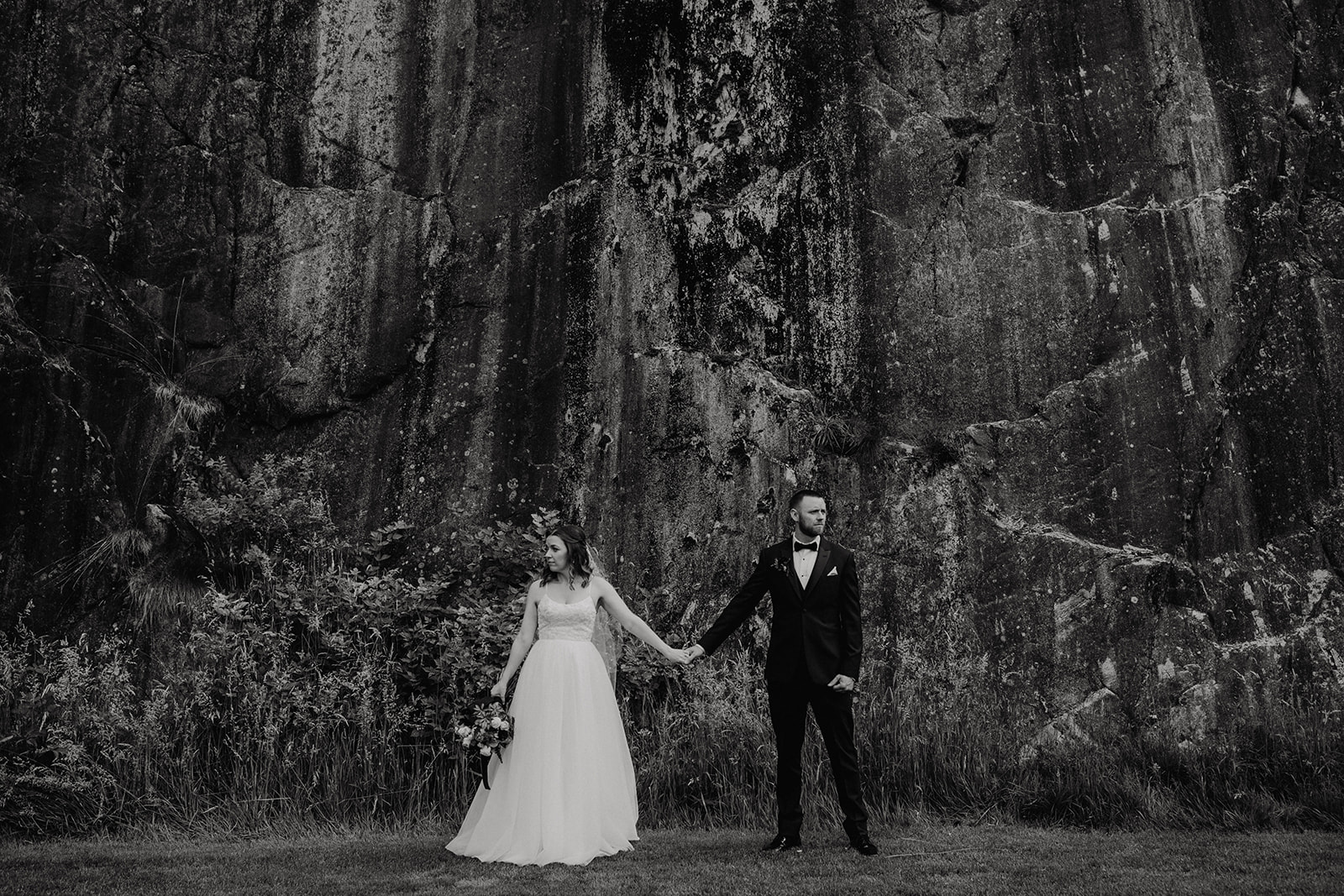 Vancouver wedding day portaits in front of mountain rock ledge
