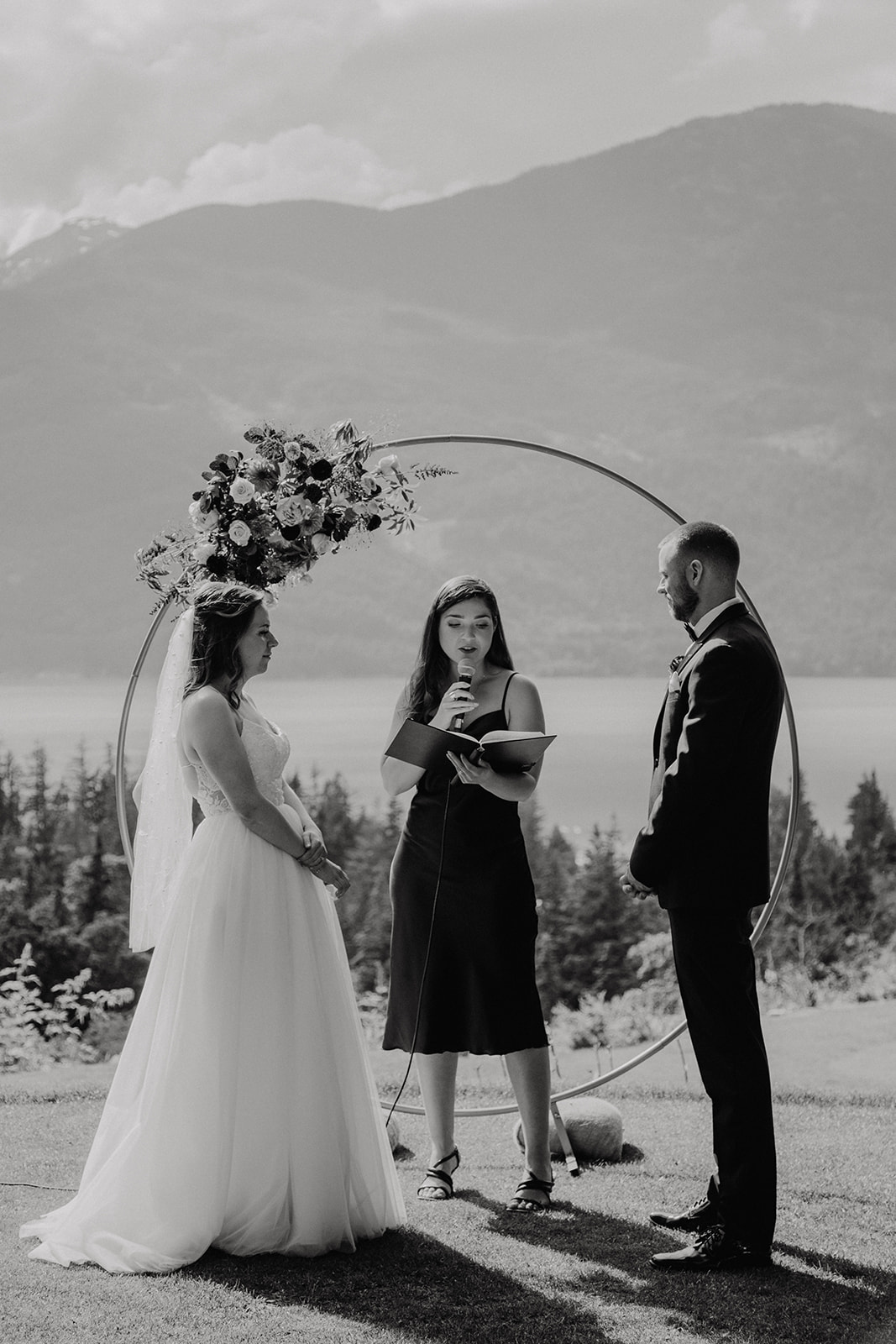 Sunny Vancouver wedding ceremony in front of mountain views