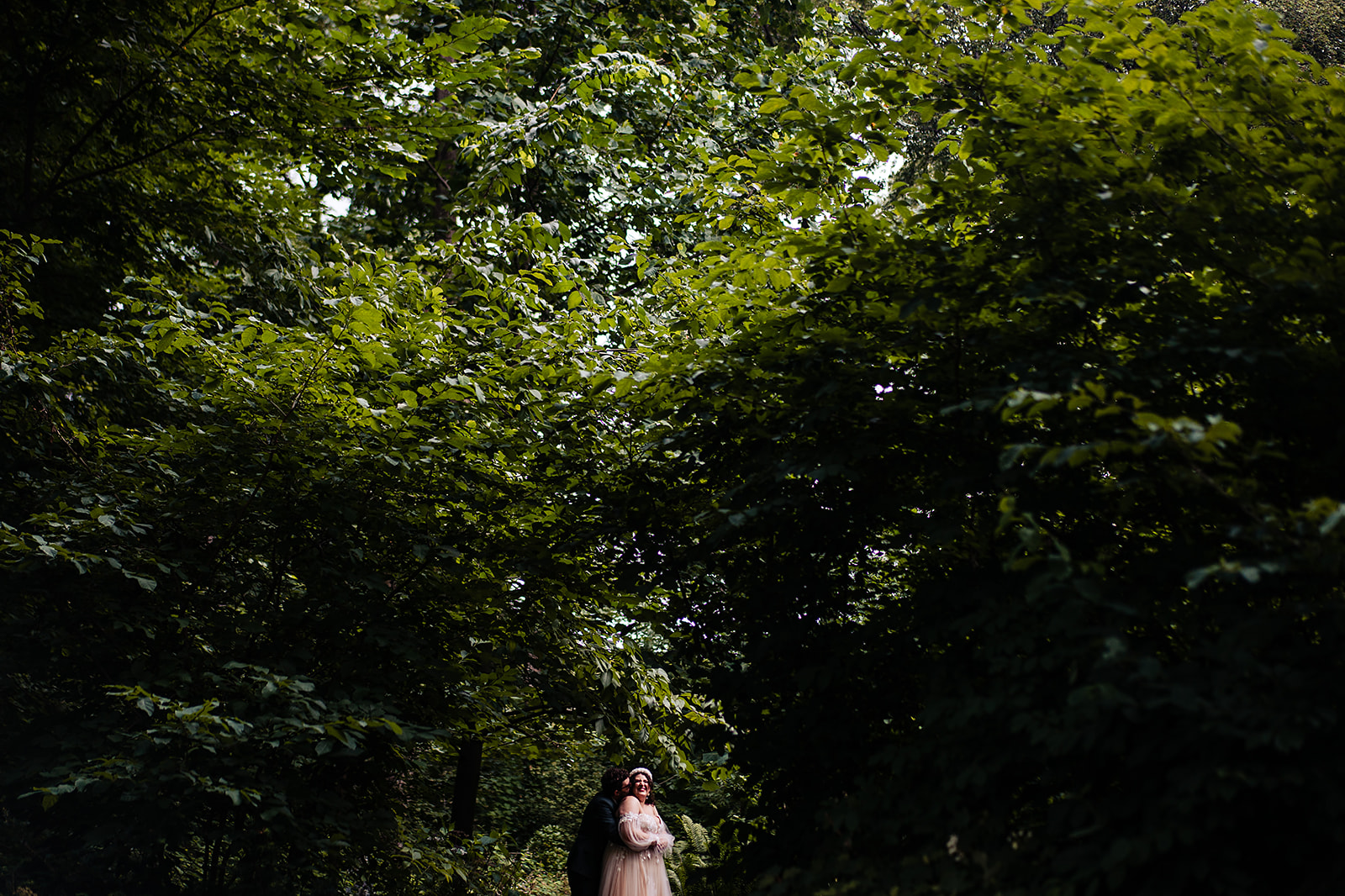 Wedding portrait in the forest of Portico Awbury