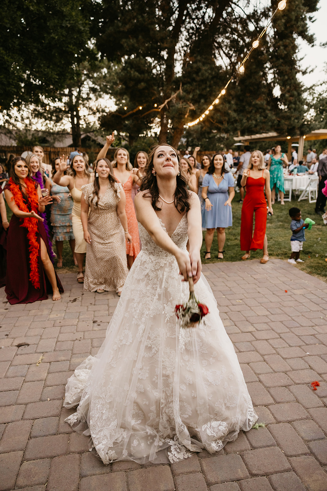 Bride tosses bouquet