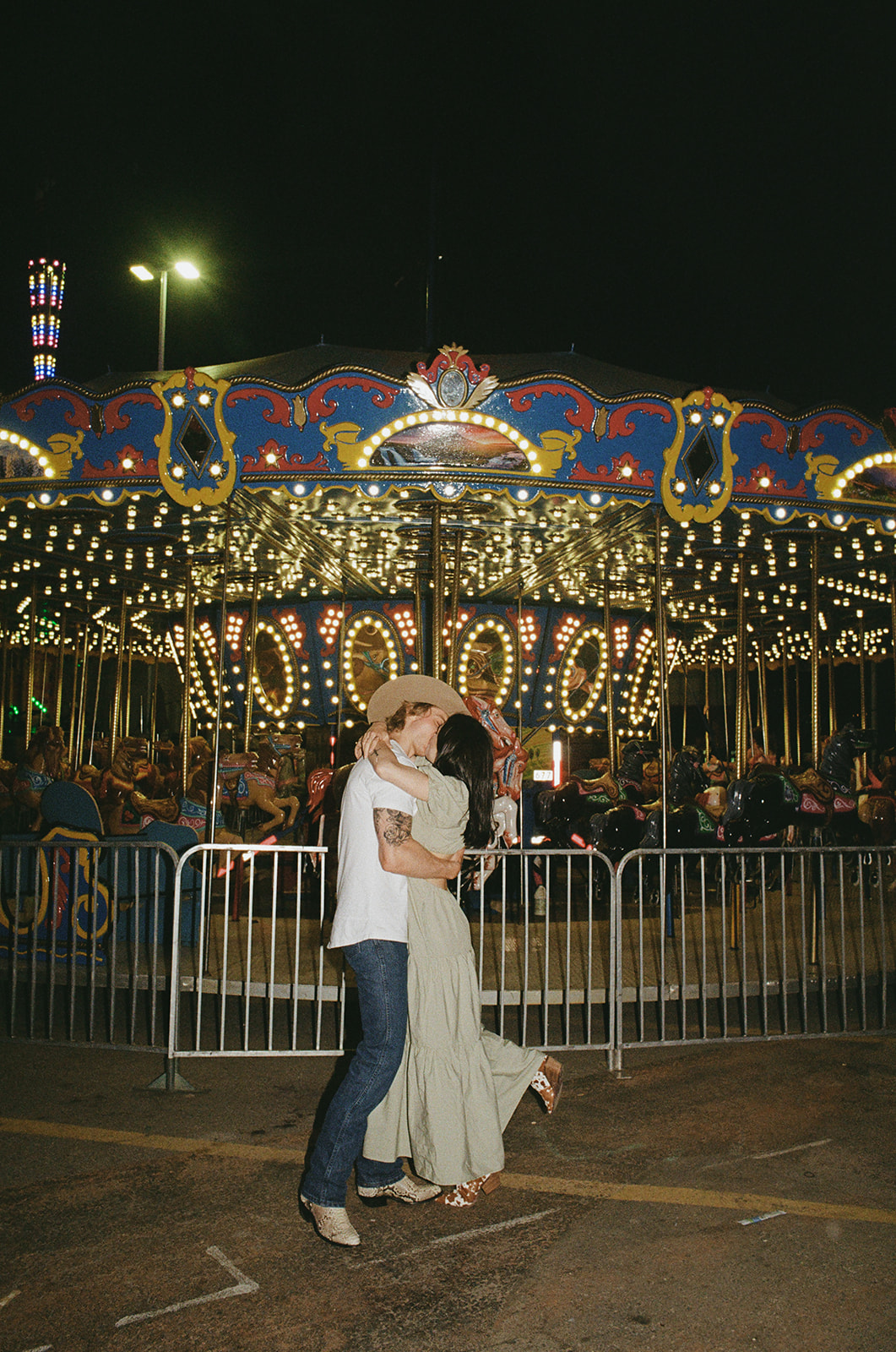 35mm film of engaged couple at the calgary alberta stampede