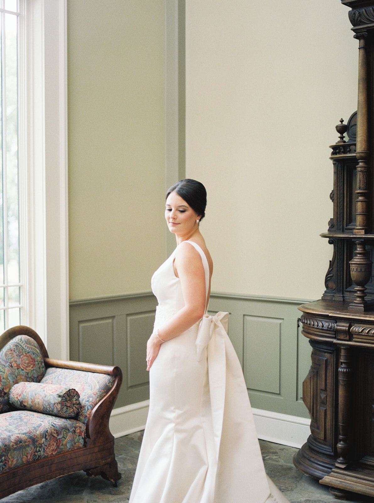 A stunning bride poses for a portrait at Burritt on the Mountain in Huntsville, Alabama