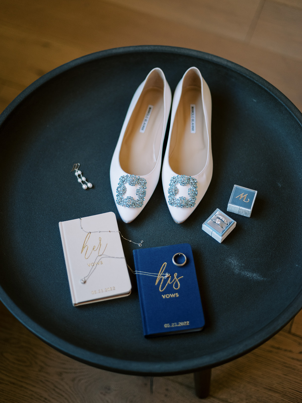 Details from a bride who got married in Zion National Park, Manolo Blahnik shoes with vow books and rings.