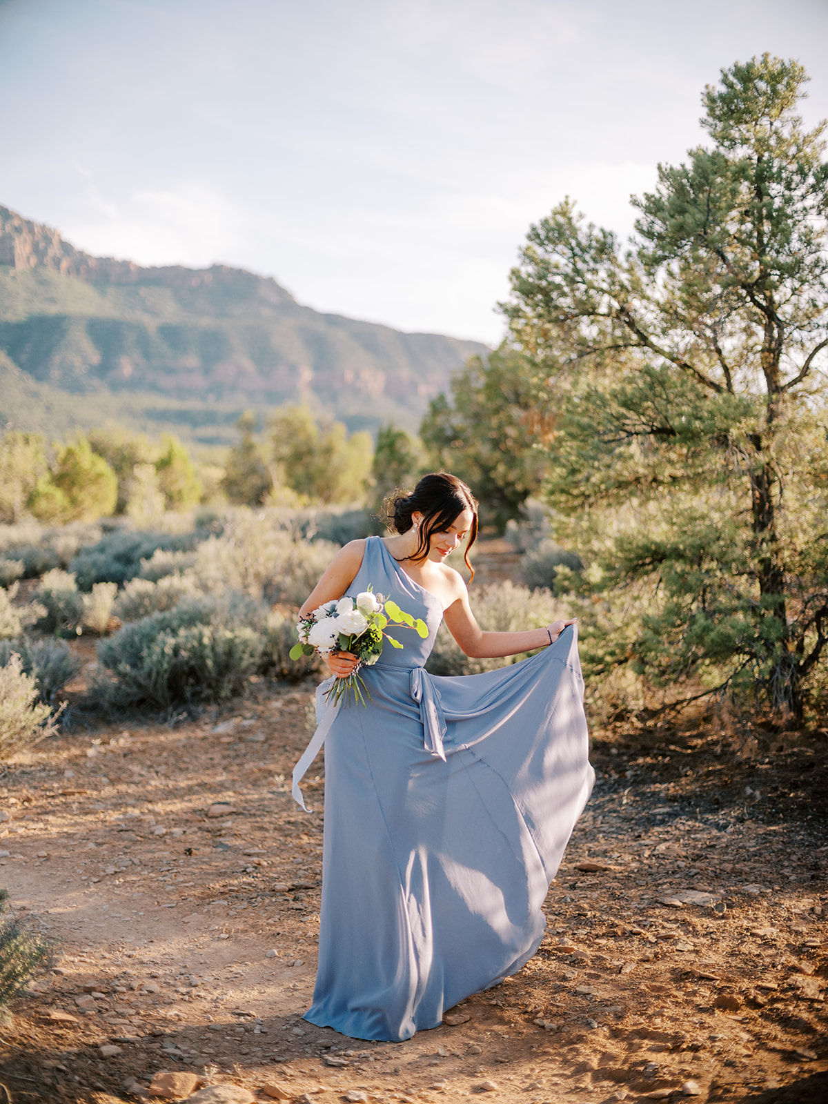 Bridesmaid in her dress after the wedding ceremony in Zion National Park