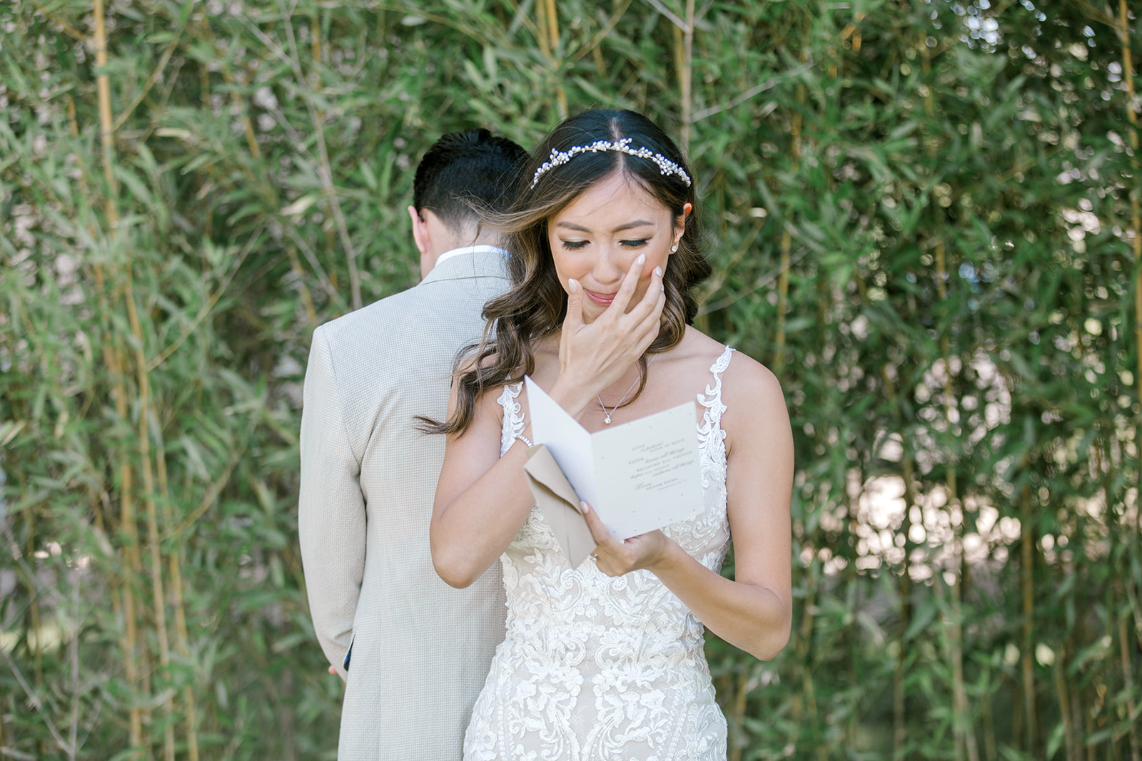 Couple shares an emotional moment during their first look on their wedding day 
