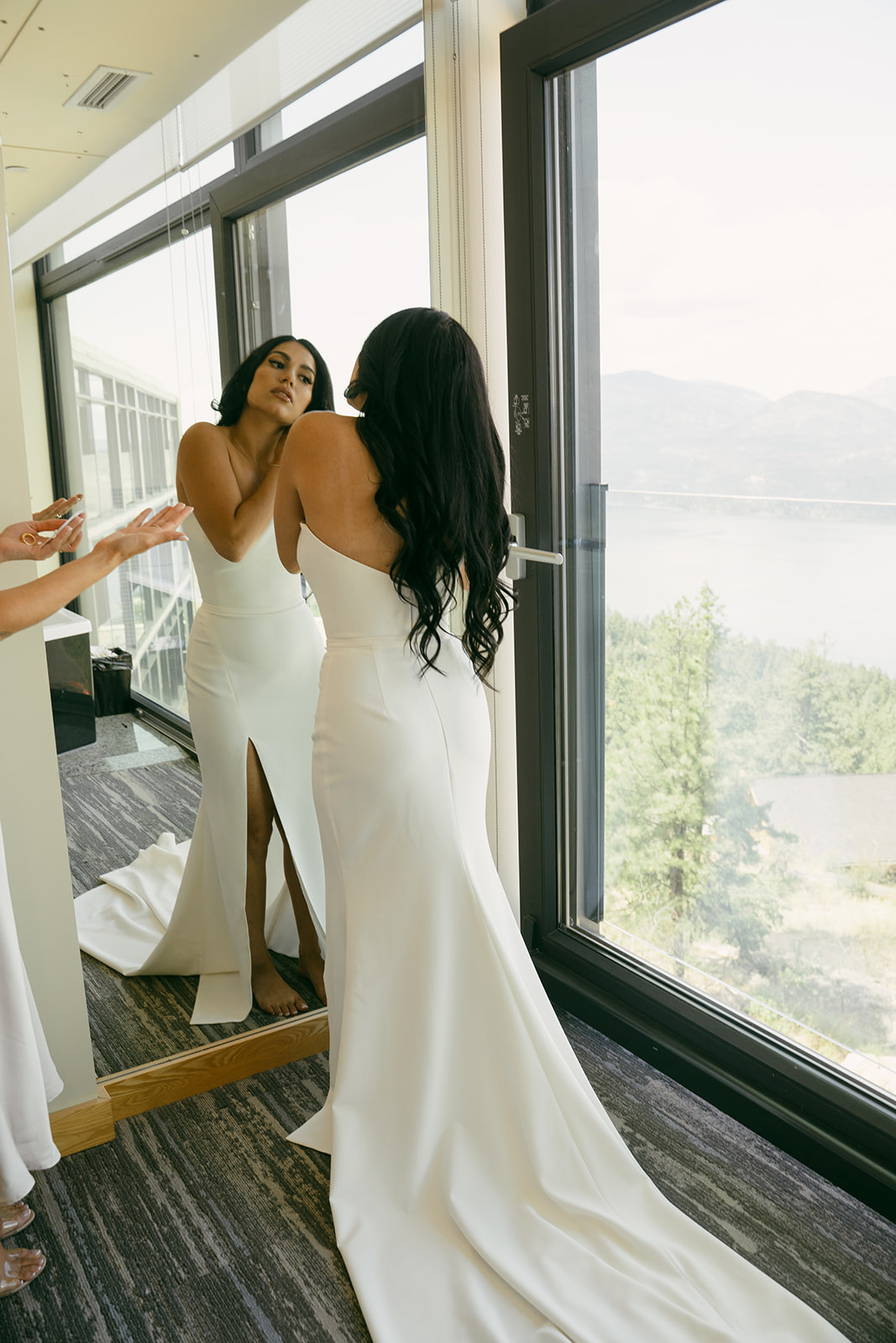 Gorgeous Silk Wedding Dress hanging from the window