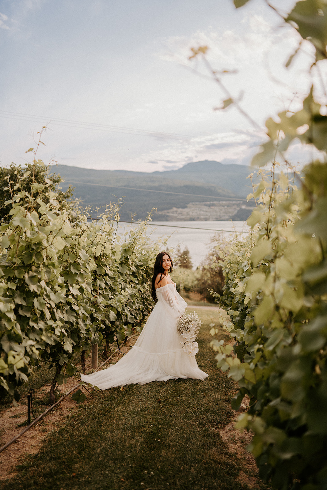 Luxury Wedding Venue Bride running through vineyard