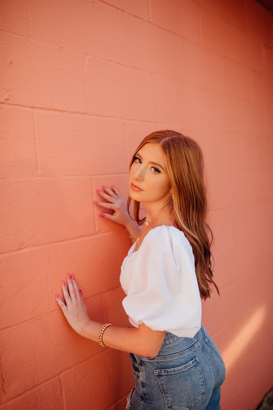 Pink Wall Senior Pictures
