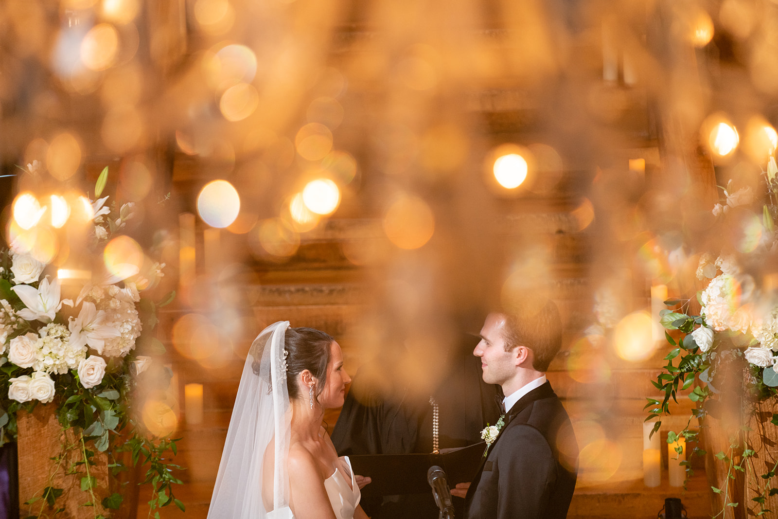 bride and groom exchange vows under the fairly lights at the Red Lion Inn
