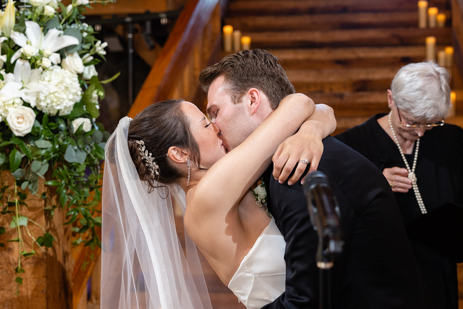 Bride and Groom kiss in the barn at the red lion inn