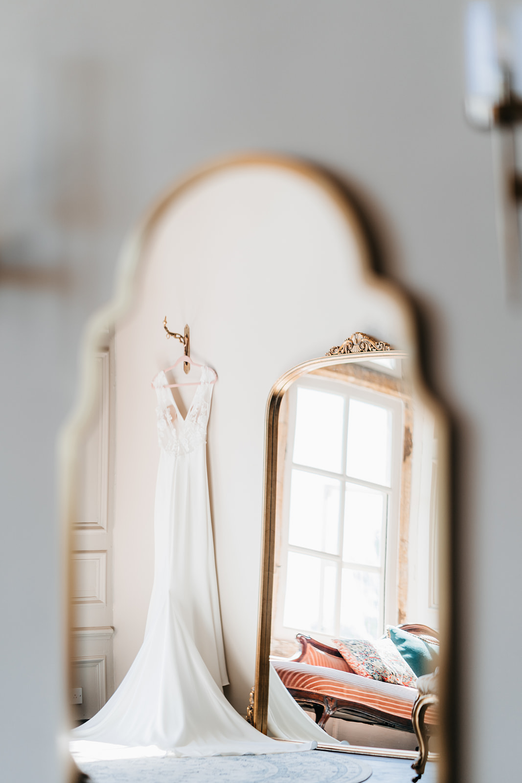 The brides dress hanging during the bridal prep