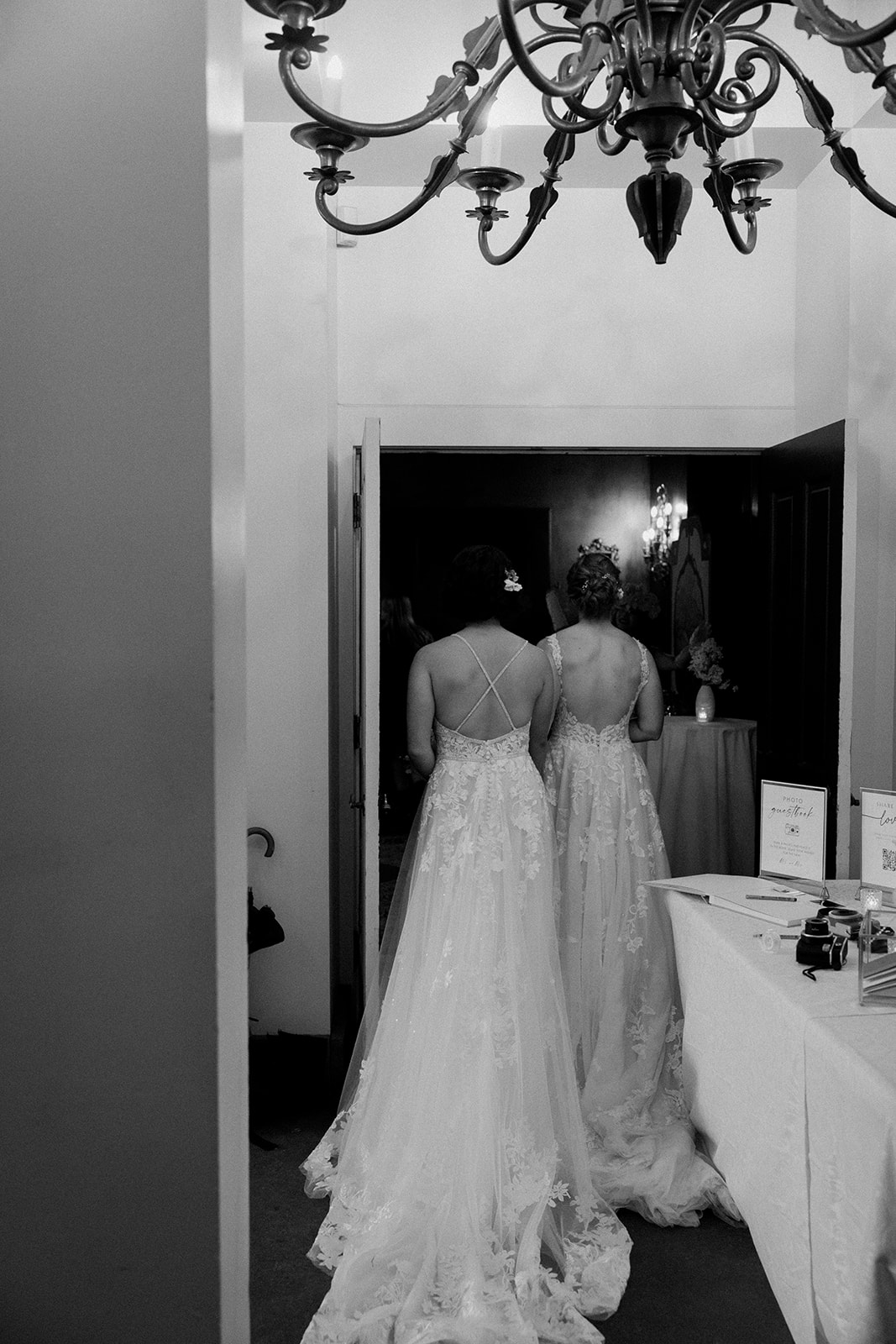 two brides walk through the door