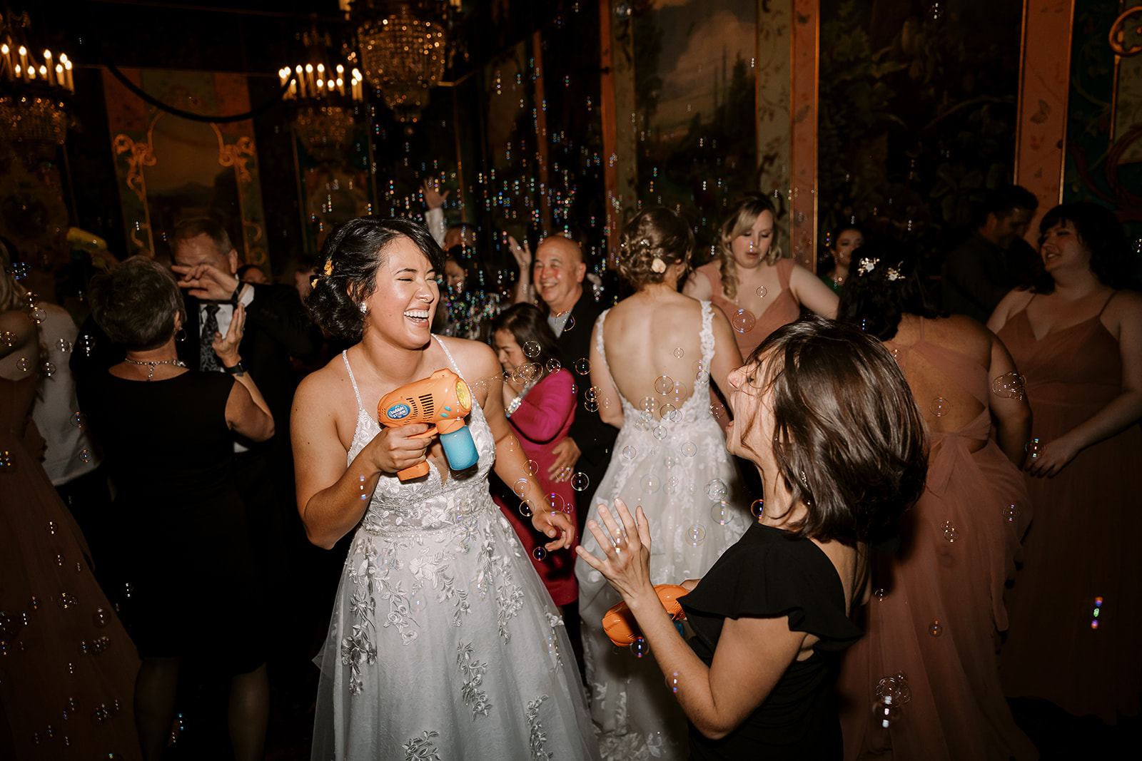 brides dancing with their guests