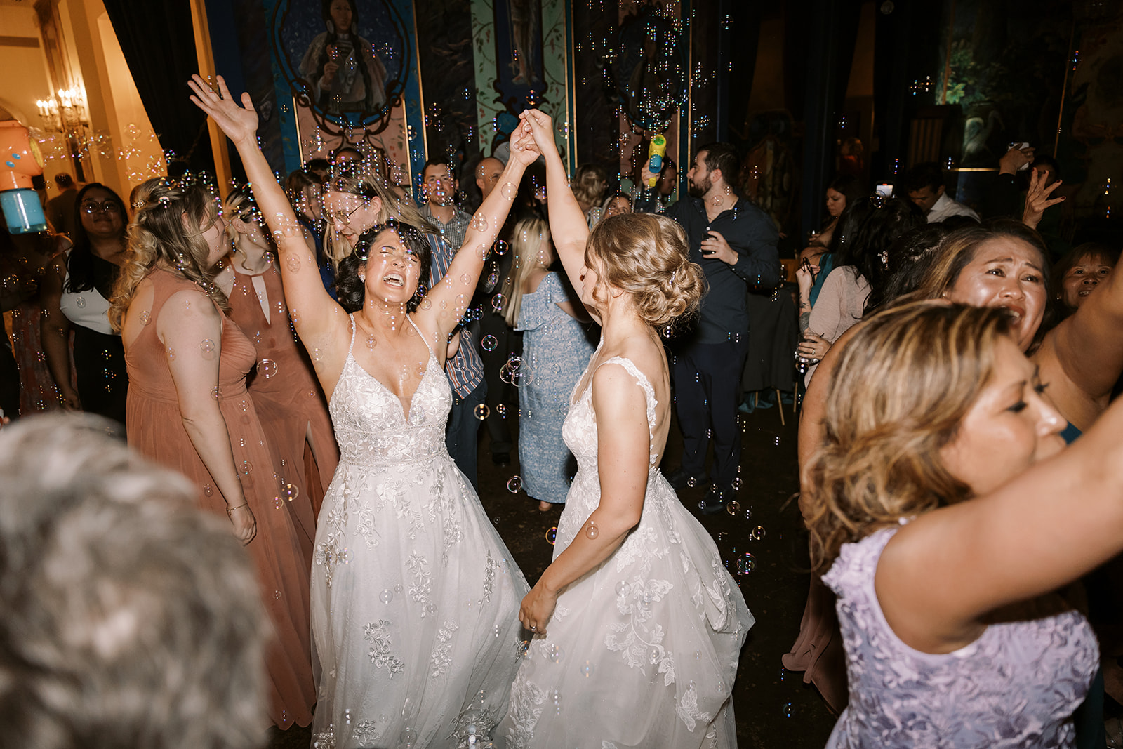 brides dancing with their guests