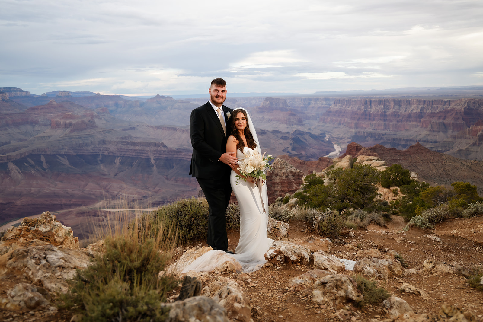 Grand Canyon Romantic Wedding. Bride and groom portrait. Luxury Arizona wedding photographers.