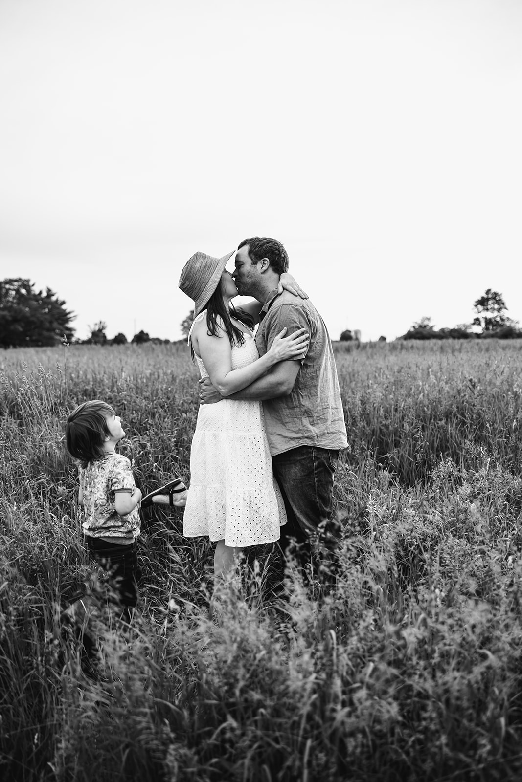 Candid and joyful family moments in the fields