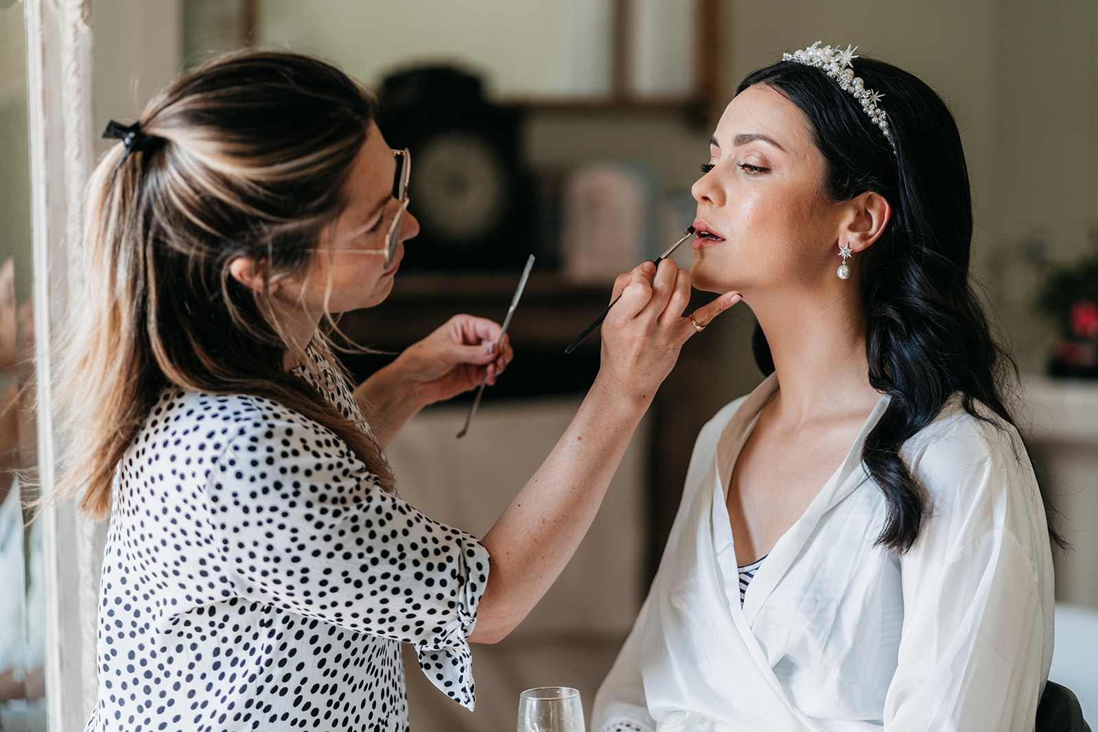 The bride getting her make up done by Annabella makeup artist