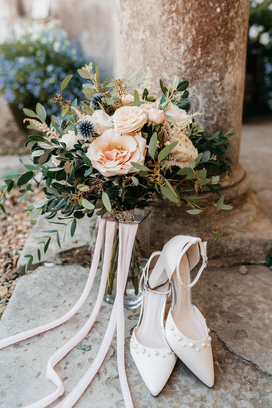 Wedding details, brides wedding shoes and wedding bouquet