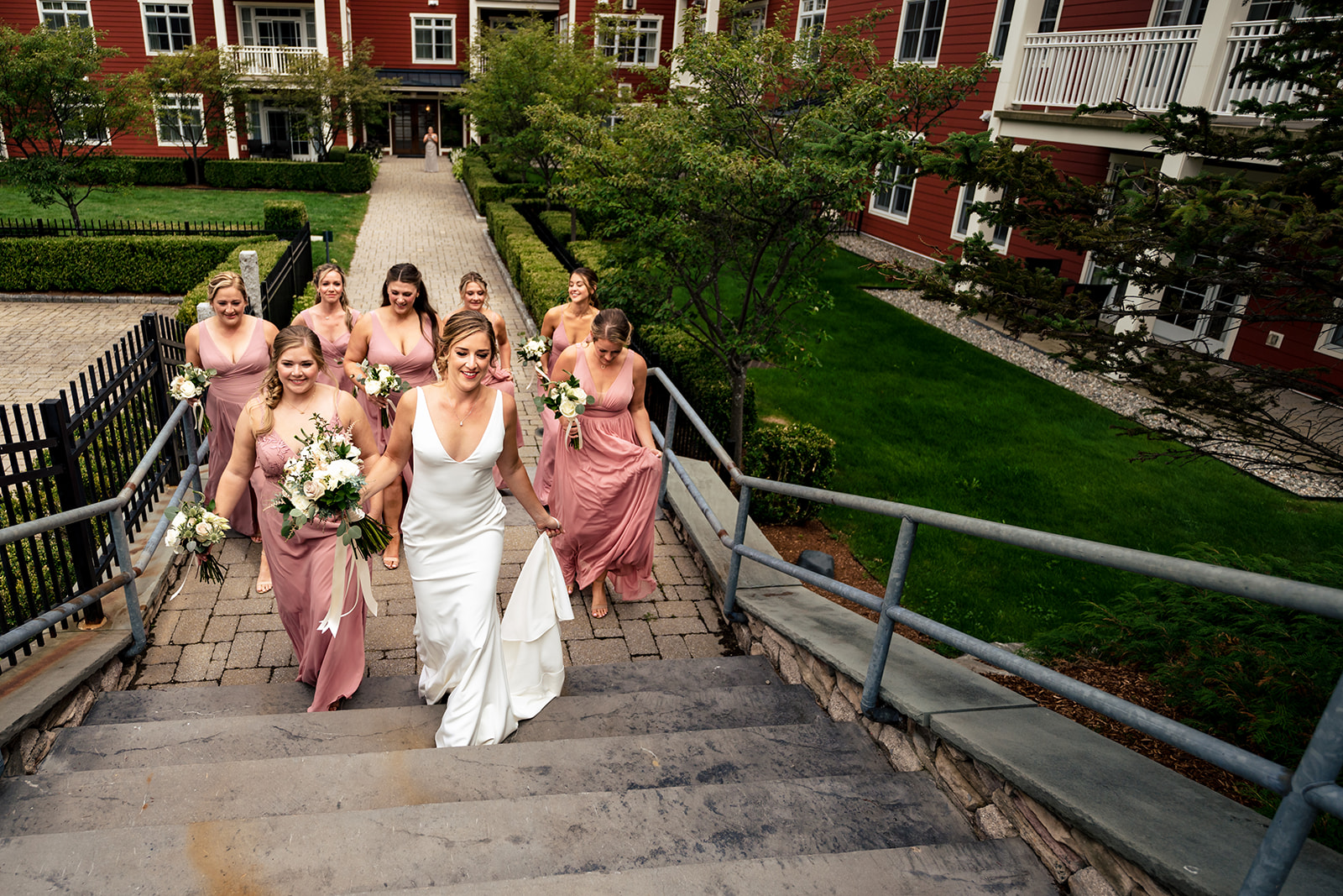 bride and bridesmaids walking together to the ceremony