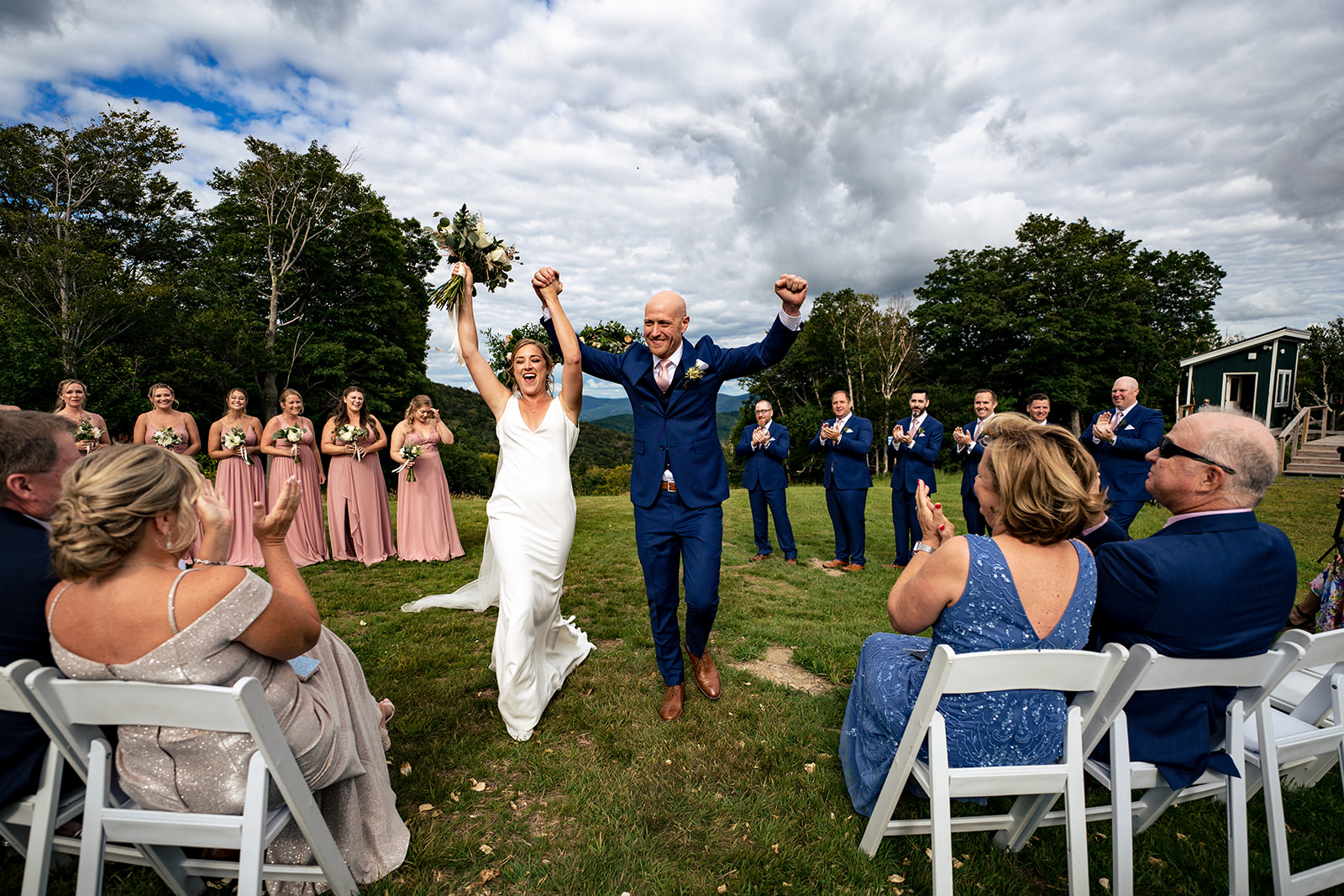 bride and groom ceremony exit at Sugarbush Resort in Vermont