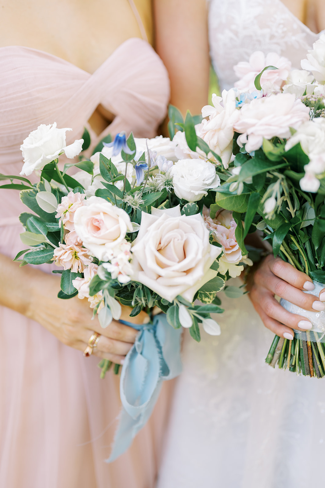 bridesmaid bouquet with blue ribbon and nails 