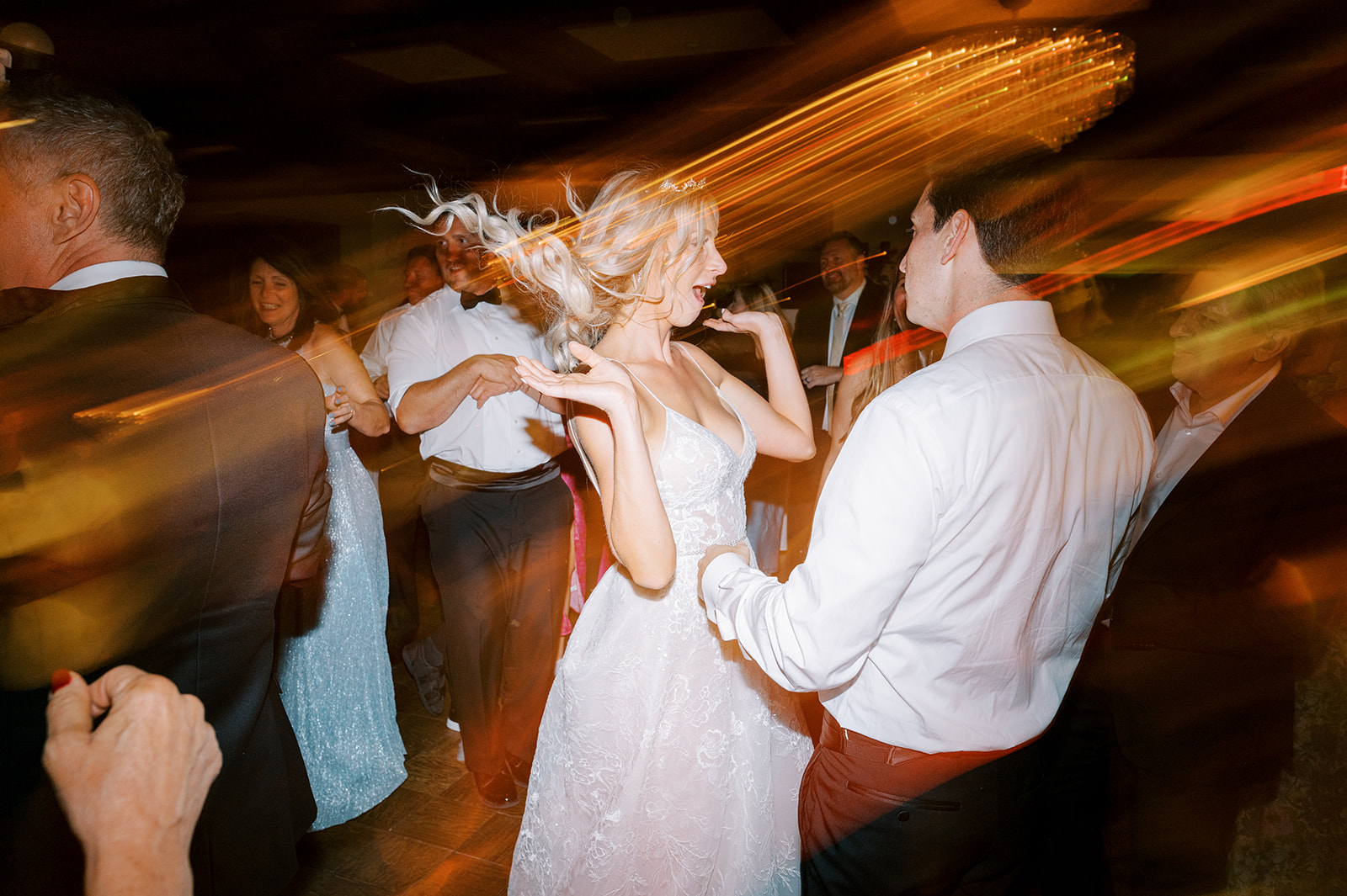 shutter drag bride and groom dancing big hair flip 