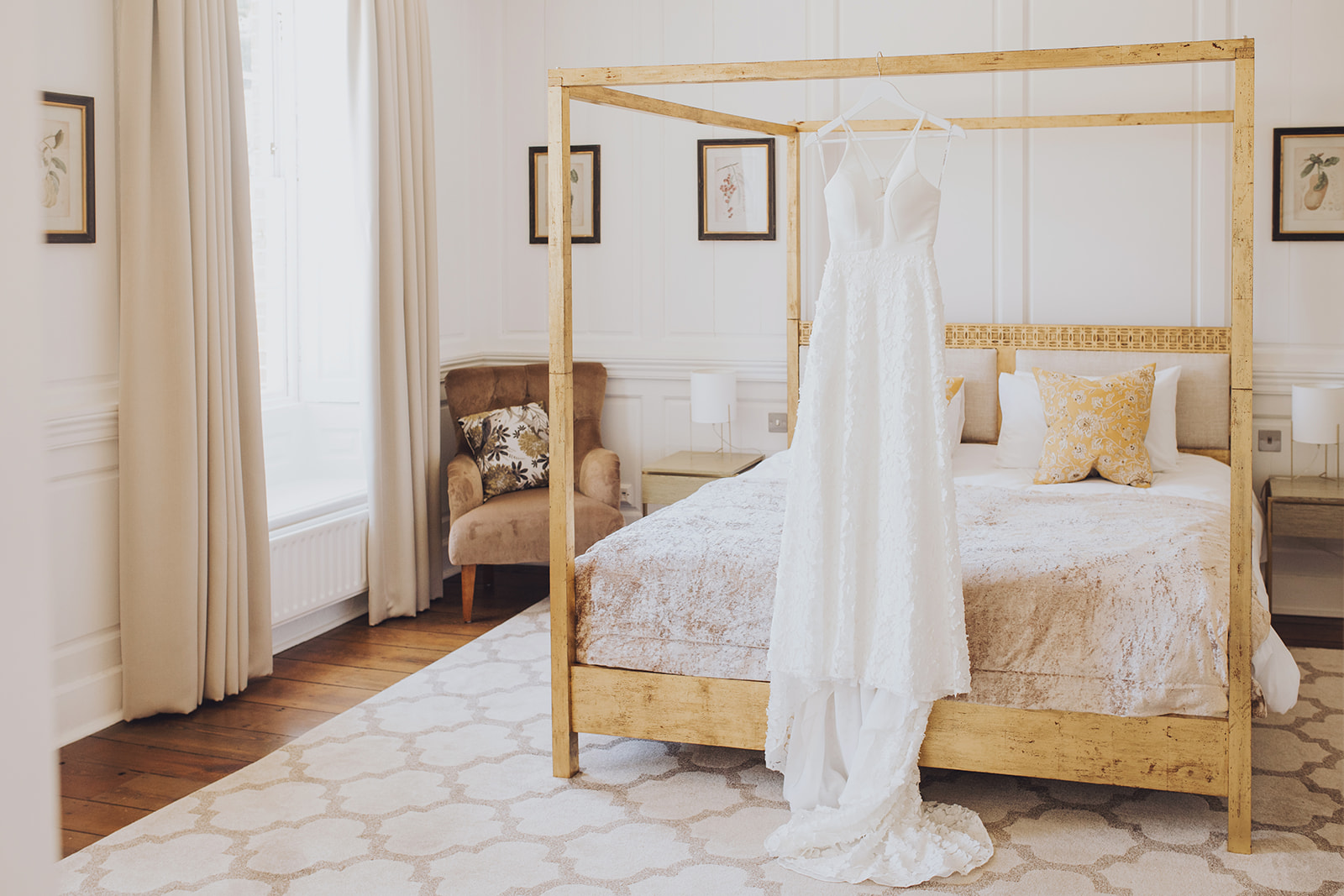 Wedding dress hanging up at Syrencot House master suite