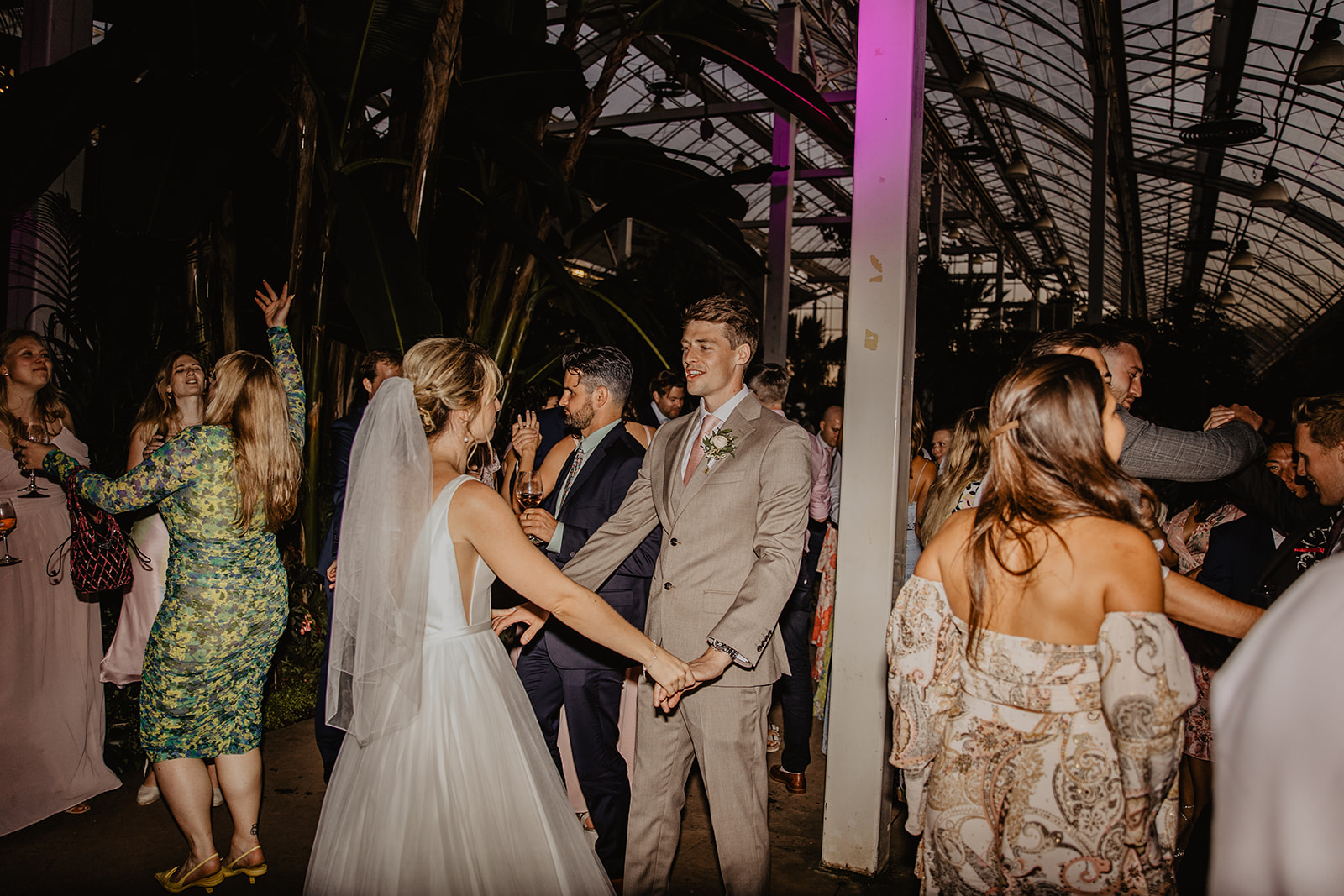 Bride and groom dancing at a RHS Gardens Wisley Wedding. By Olive Joy Photography