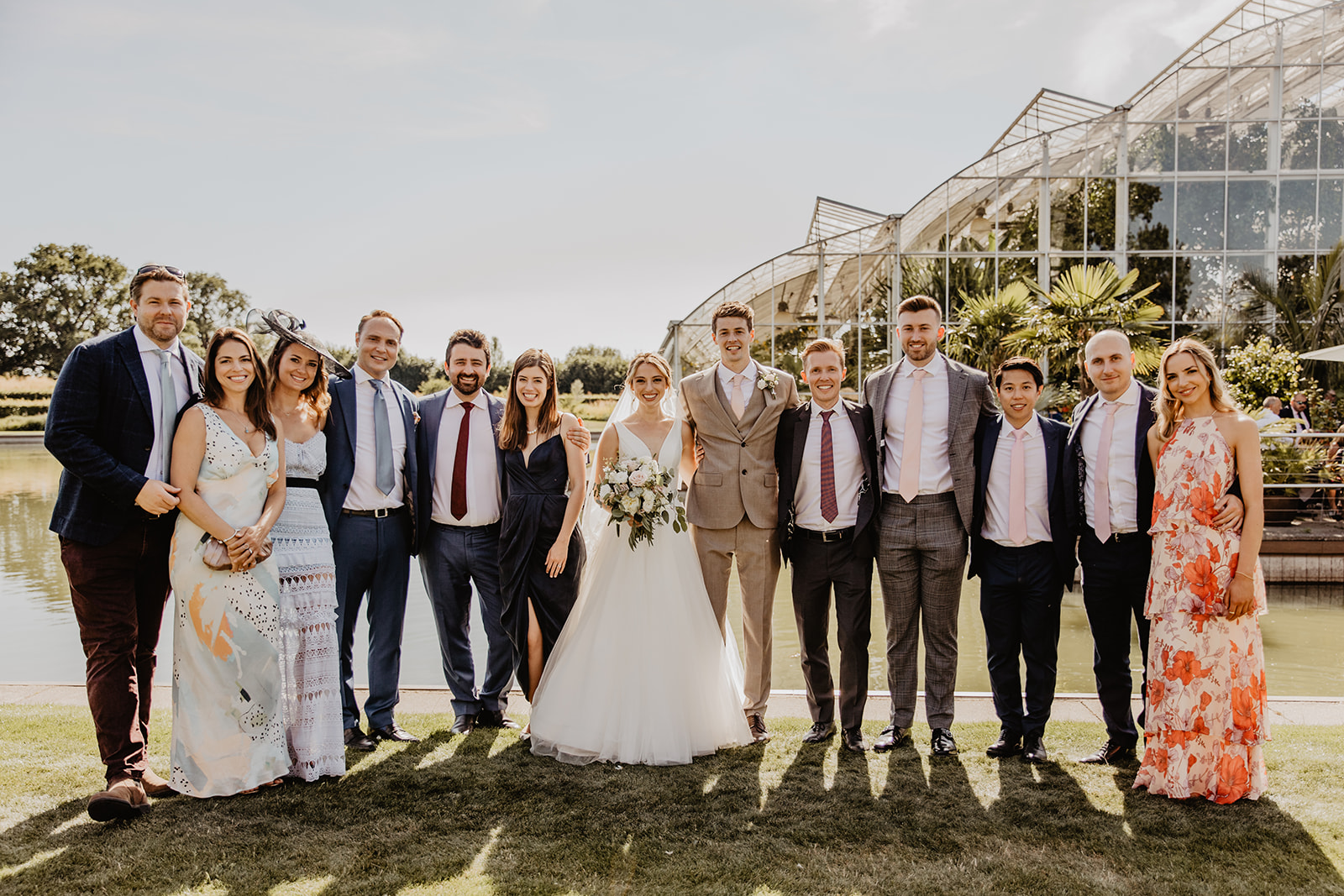 Bride, groom and family at a RHS Gardens Wisley Wedding. By Olive Joy Photography