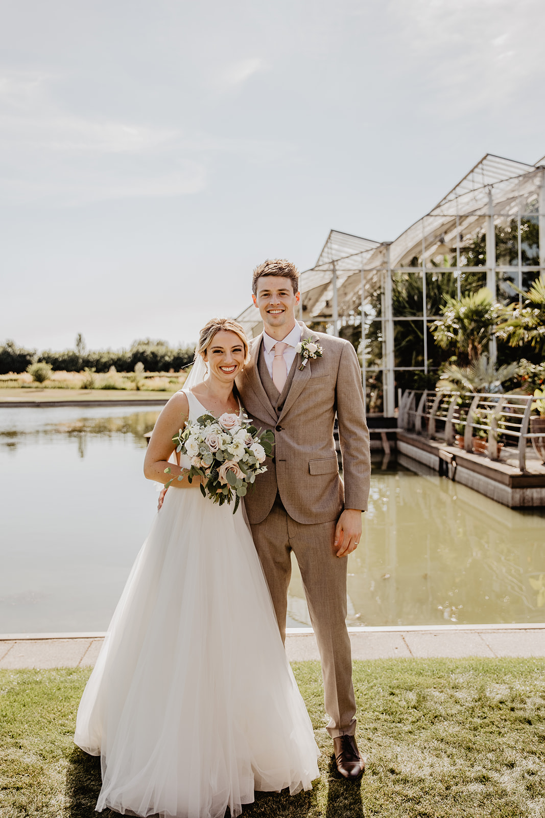 Bride and groom at a RHS Gardens Wisley Wedding. By Olive Joy Photography