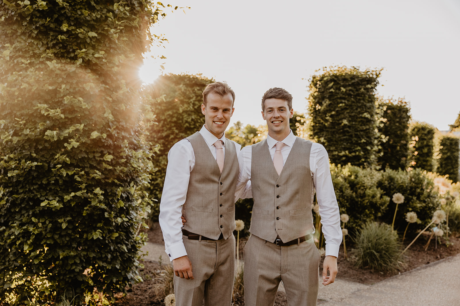 Groom and best man at a RHS Gardens Wisley Wedding. By Olive Joy Photography