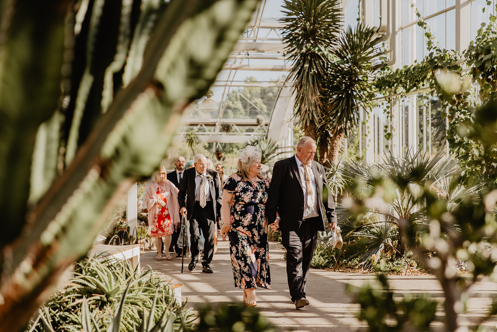 Guests arriving at the reception at a RHS Gardens Wisley Wedding. By Olive Joy Photography