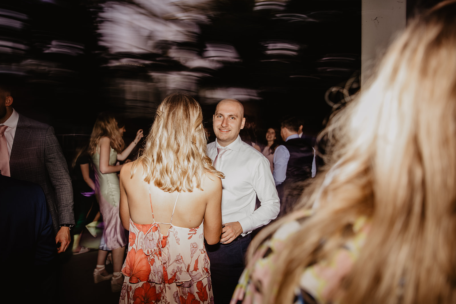 Guests dancing at a RHS Gardens Wisley Wedding. By Olive Joy Photography