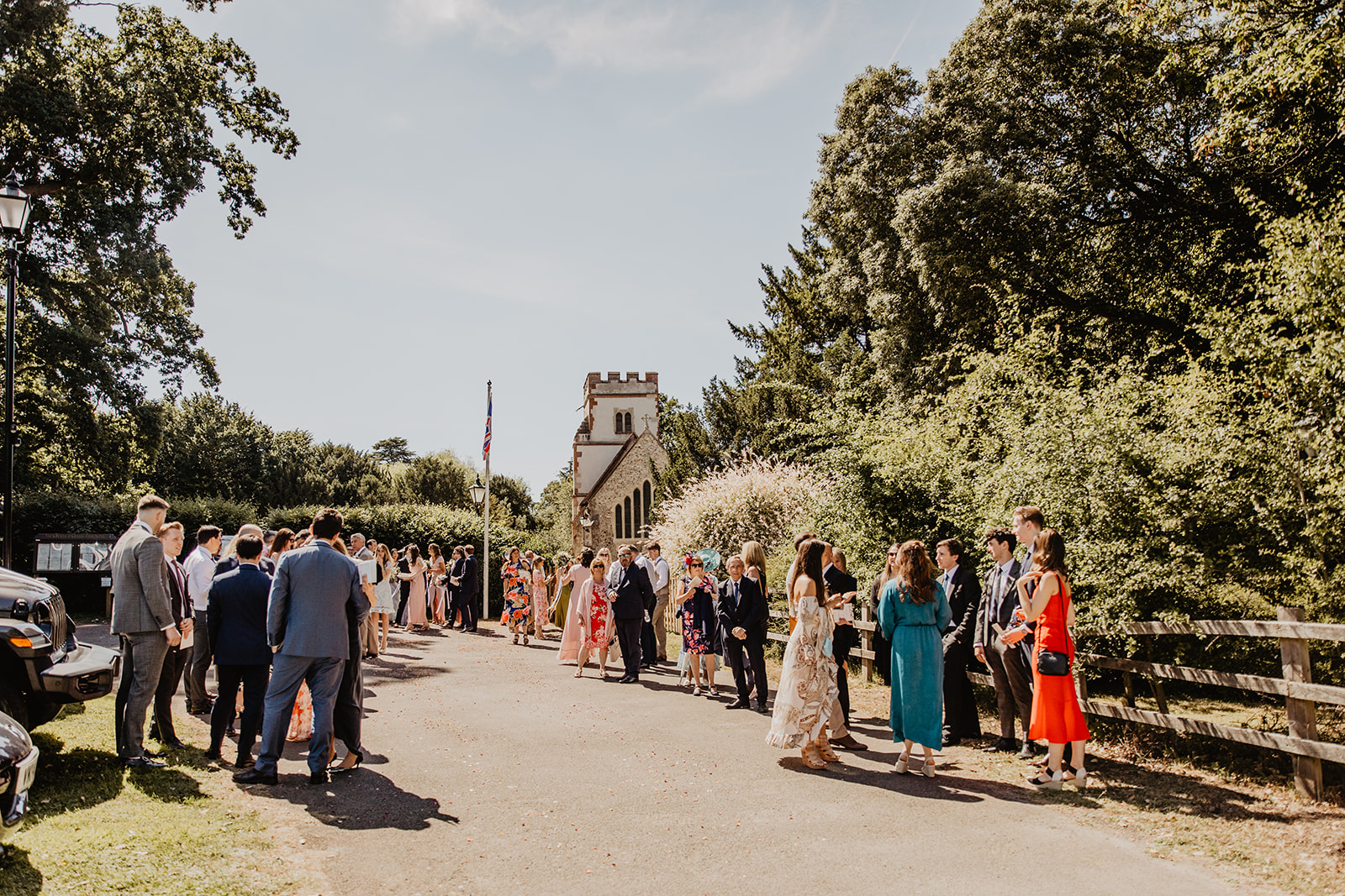 Wedding guests at an RHS Gardens Wisley Wedding. By Olive Joy Photography