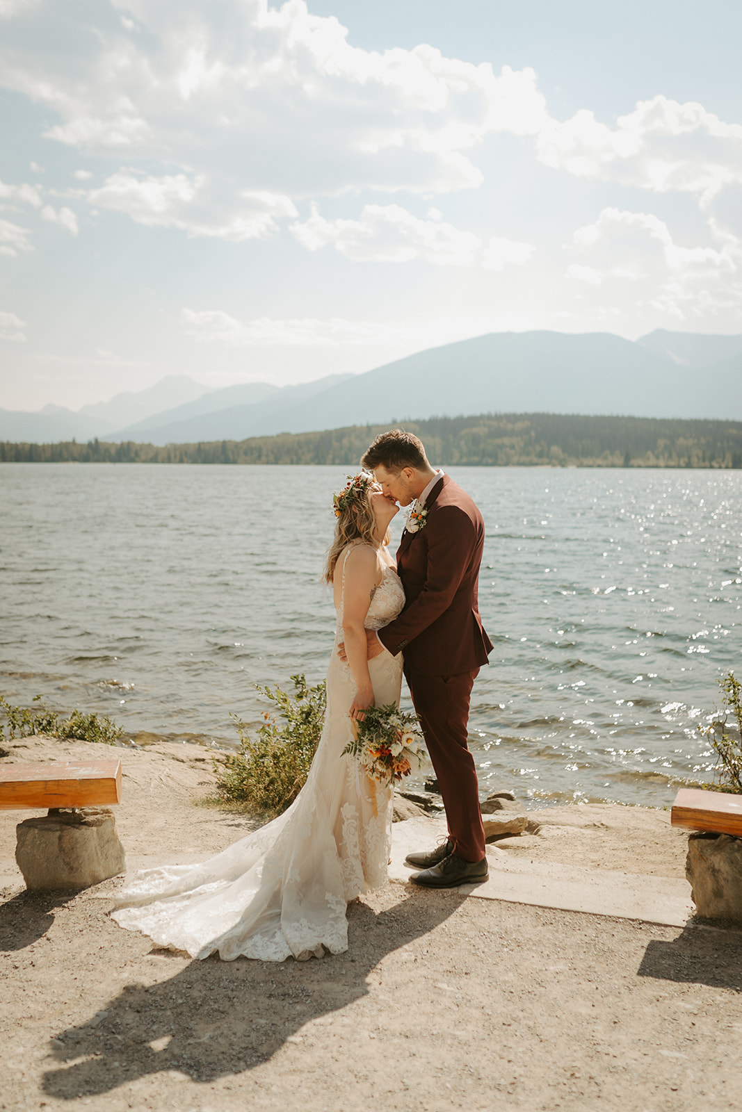 Bride and grrom getting married at Pyramid Lake in Jasper, Alberta