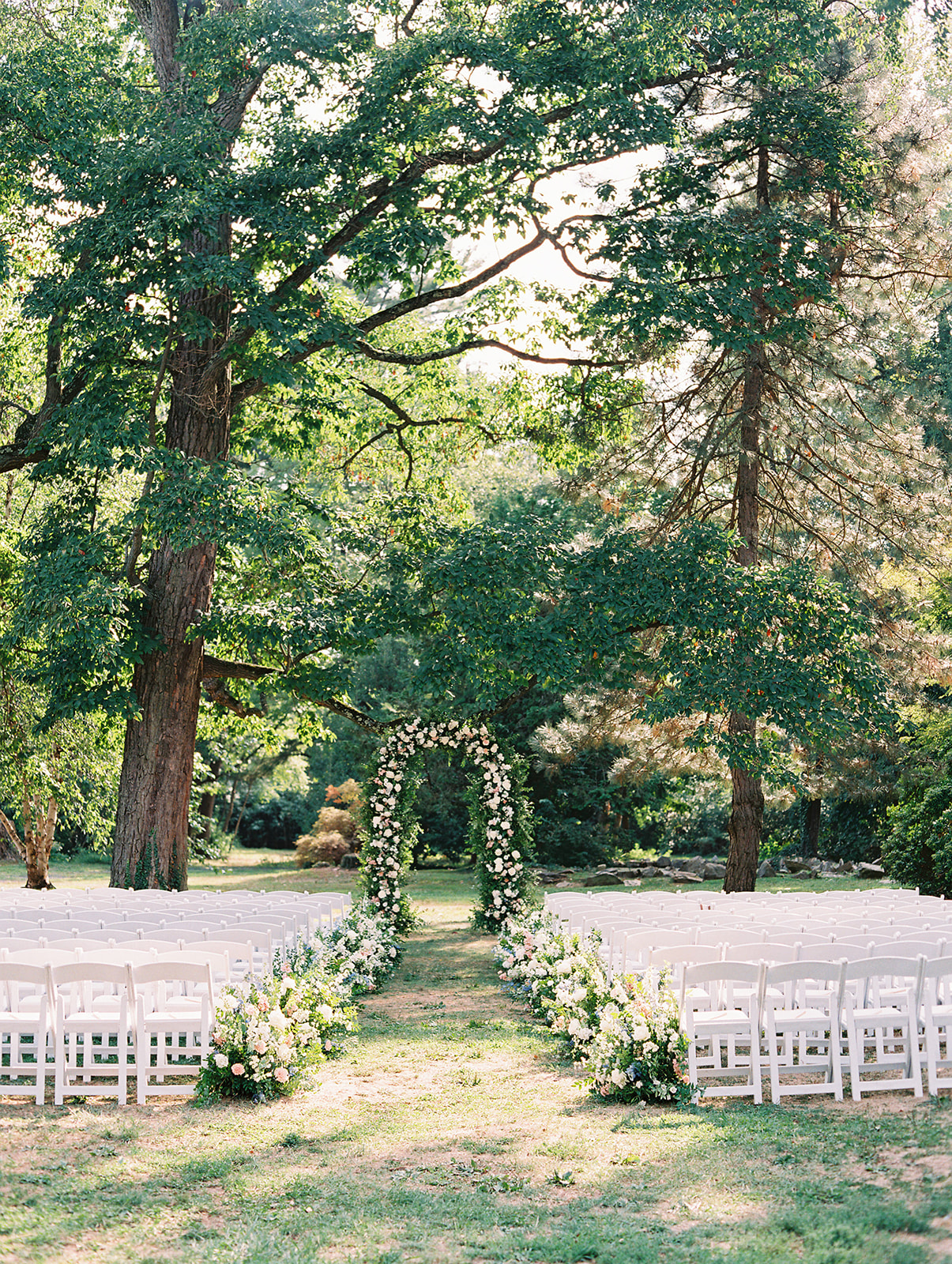 romantic lawn ceremony at Timeless Garden Wedding at Historic Glen Foerd Estate in Philadelphia, PA