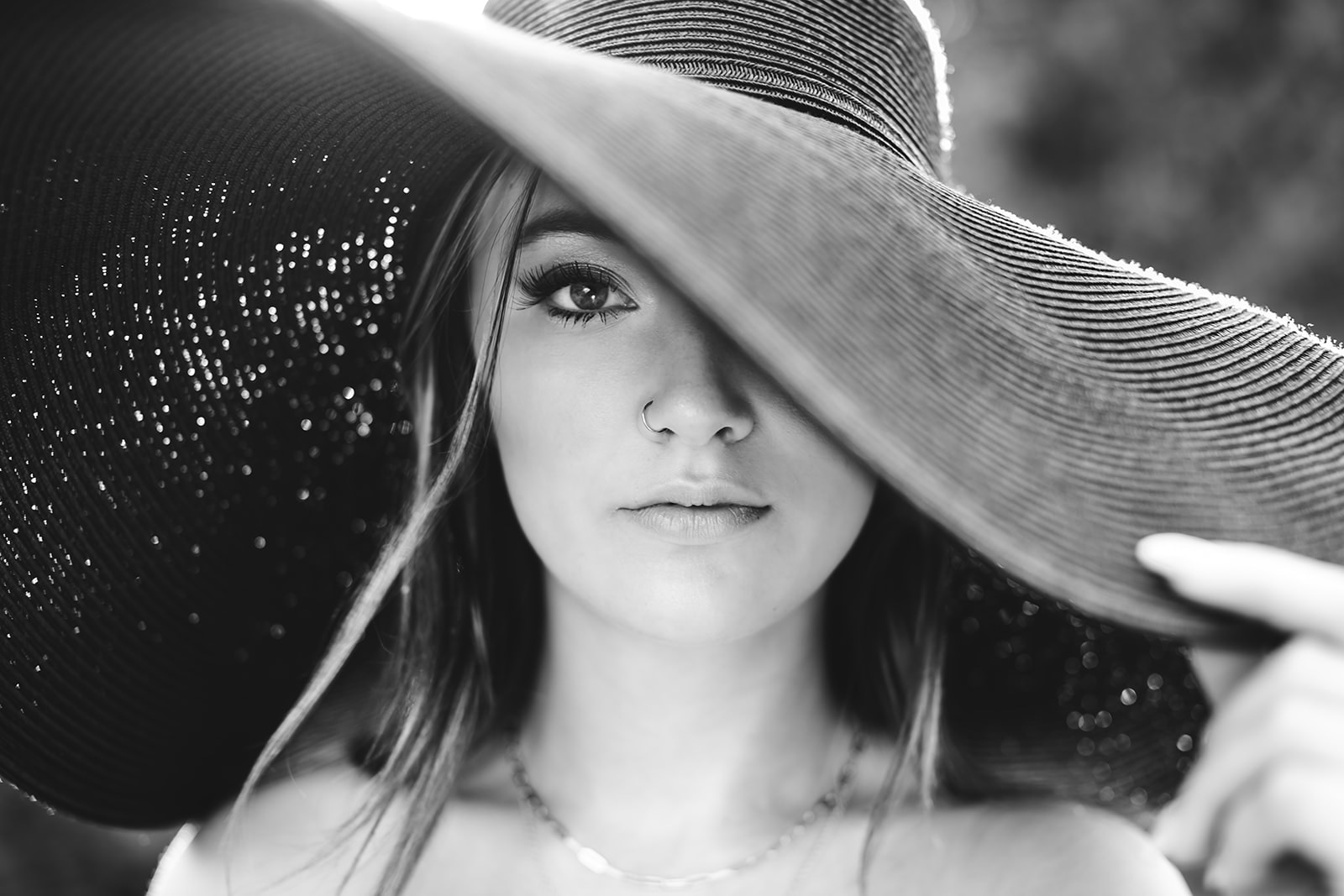 Caitlyn in her sun hat during her mackinaw island senior portrait session