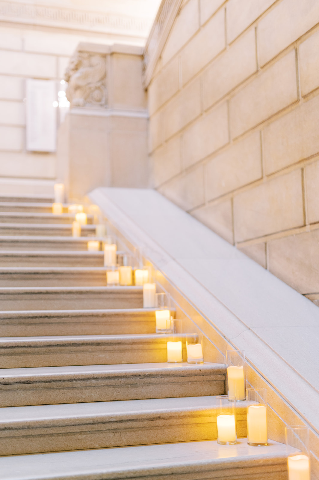 romantic candles line the stone stairs for a chic wedding at the Free Library of Philadelphia 