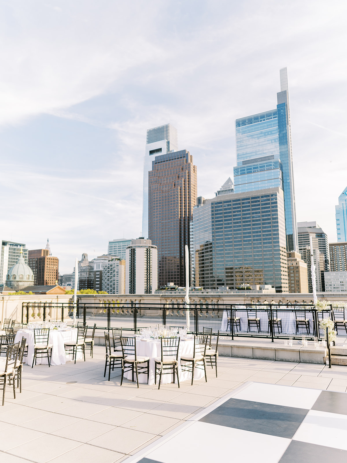 summer rooftop wedding reception at the Free Library of Philadelphia with the city skyline 