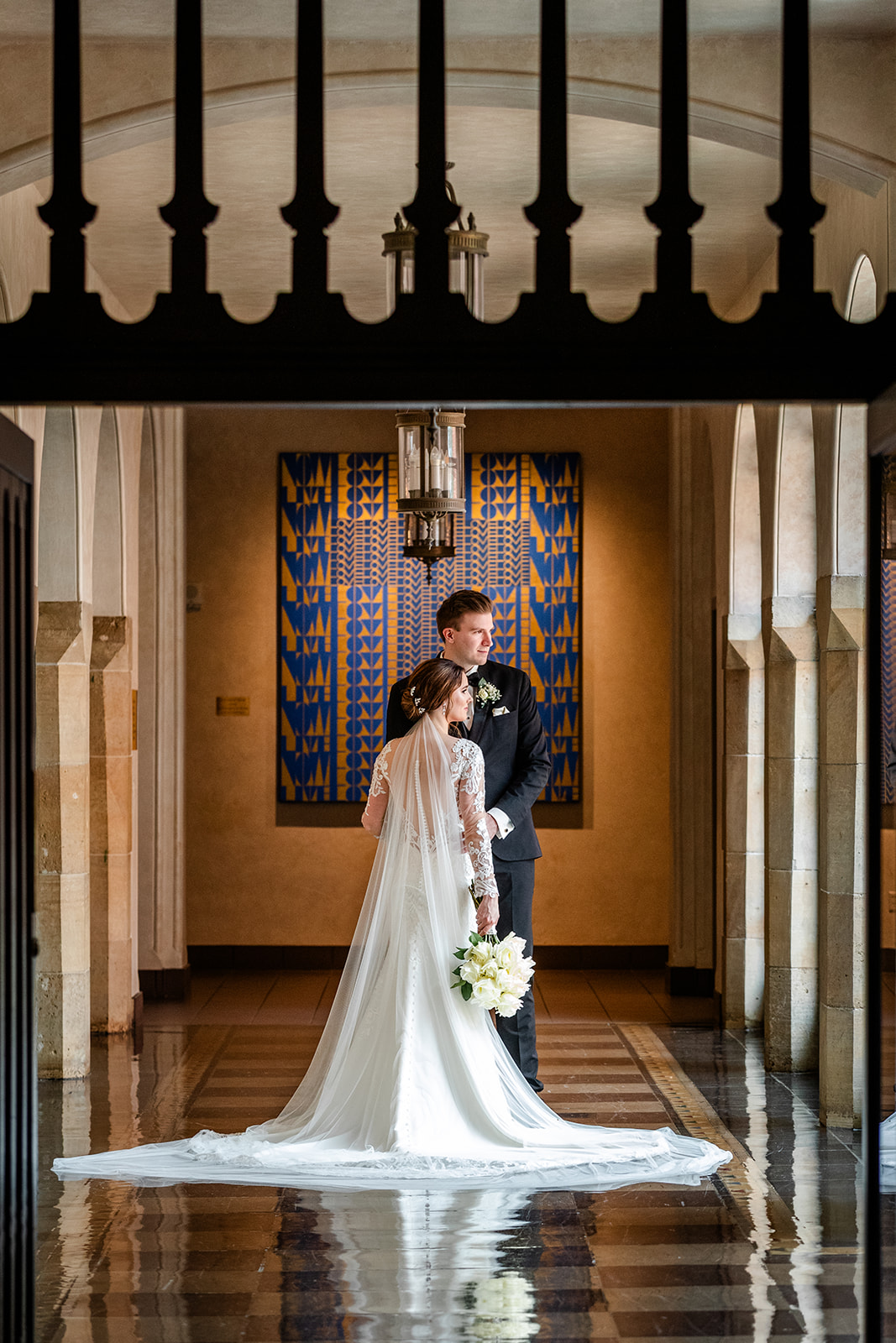 Bride and Groom by window in First Plymouth Church