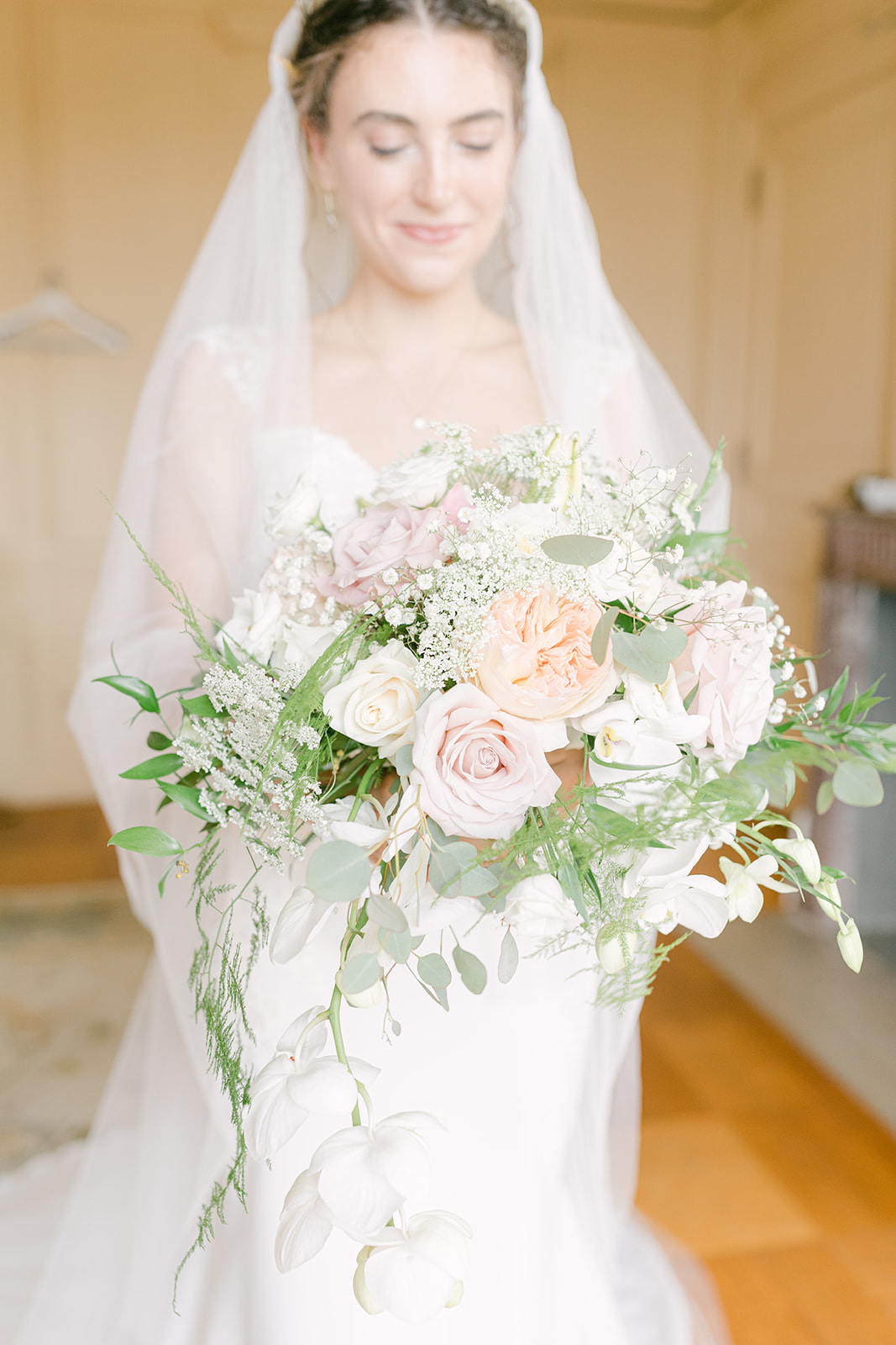 bride with her wedding bouquet at glen manor house