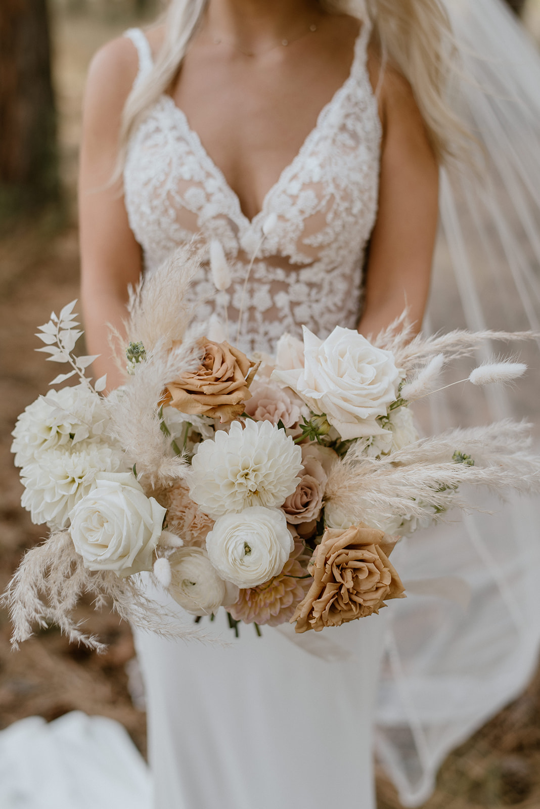 Boho wedding bouquet with toffee roses and white dahlias