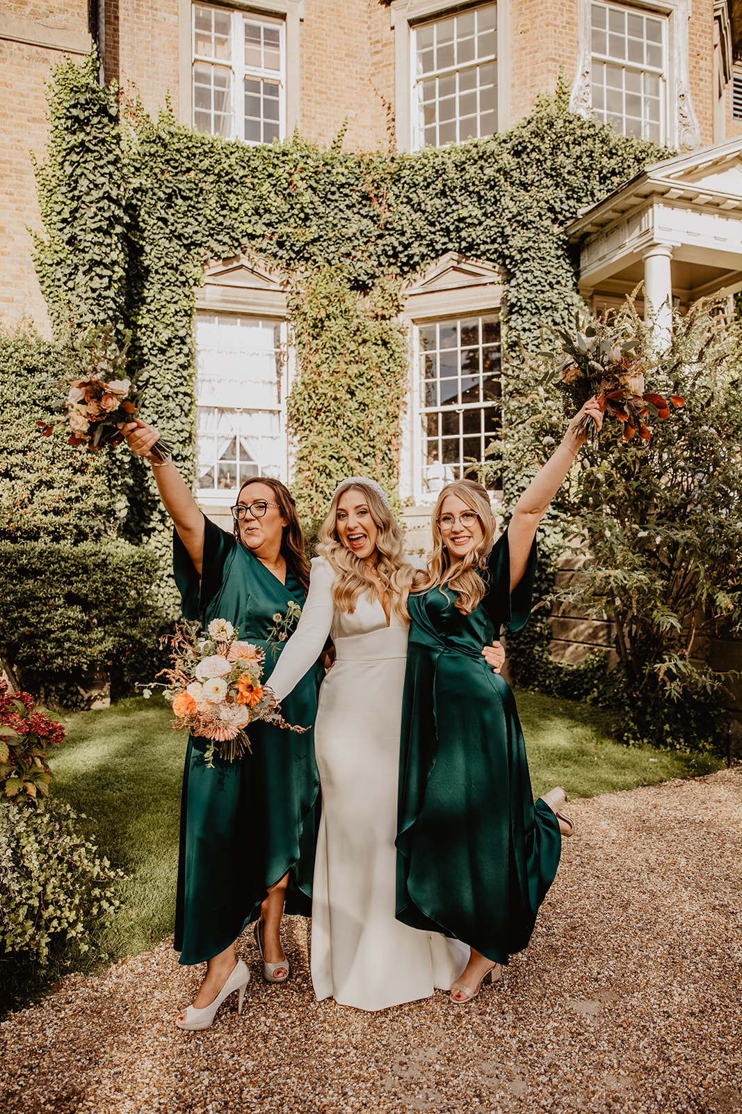 Bride and bridesmaids at a Hampton Court House Wedding. By Olive Joy Photography