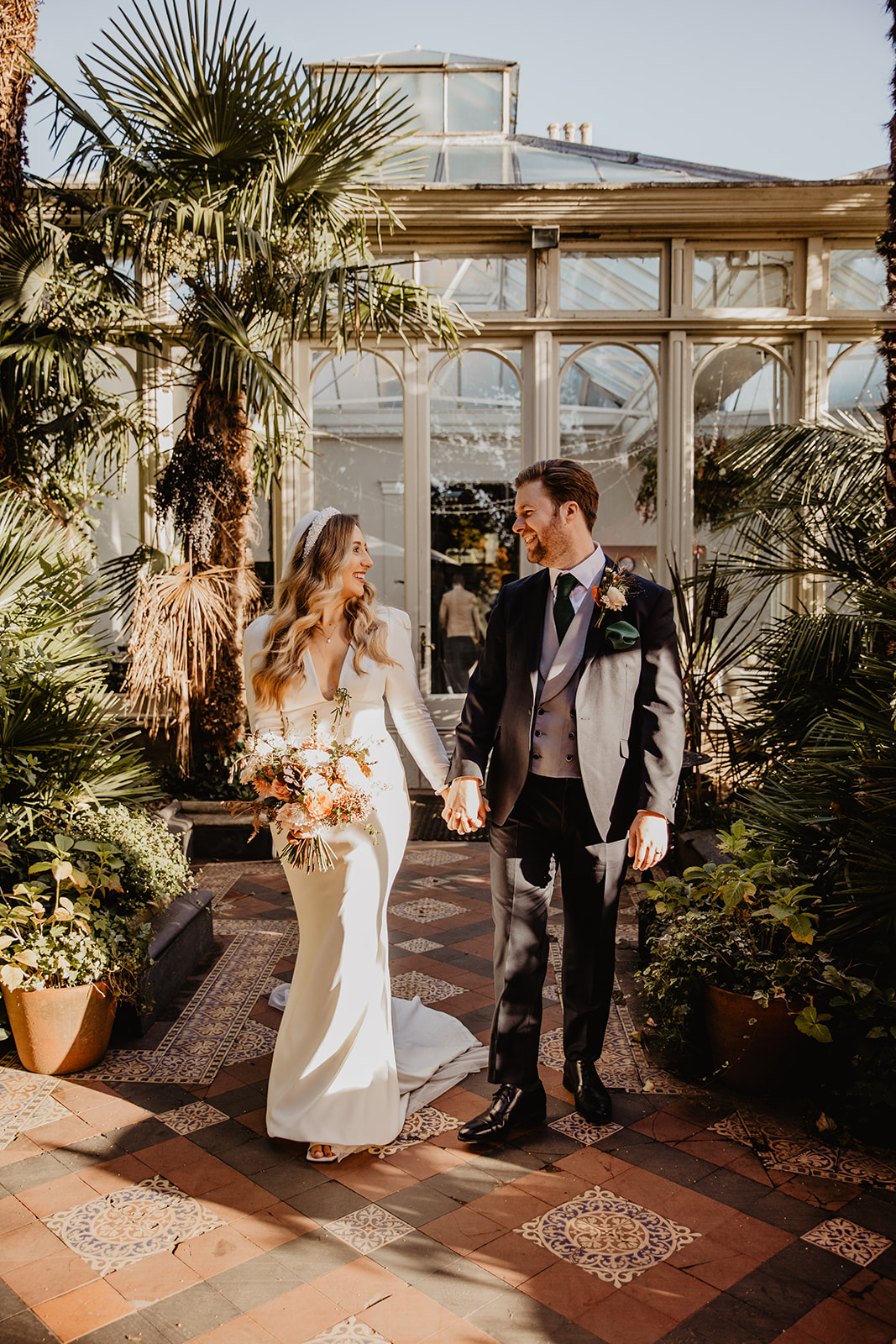 Bride and Groom in gardens at a Hampton Court House Wedding. By Olive Joy Photography