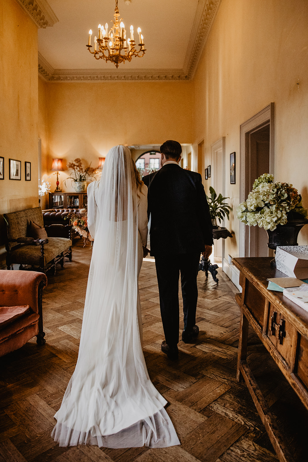 Bride and groom at a Hampton Court House Wedding. By Olive Joy Photography