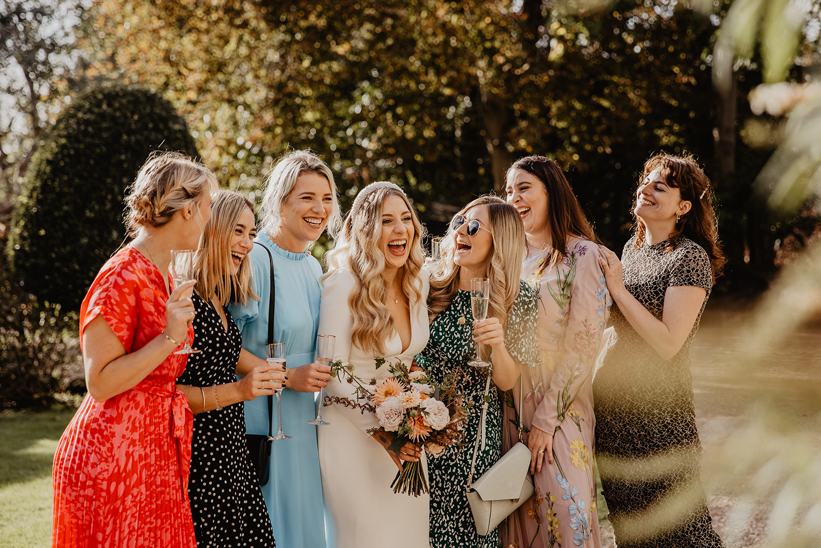 Bride and her guests at a Hampton Court House Wedding. By Olive Joy Photography